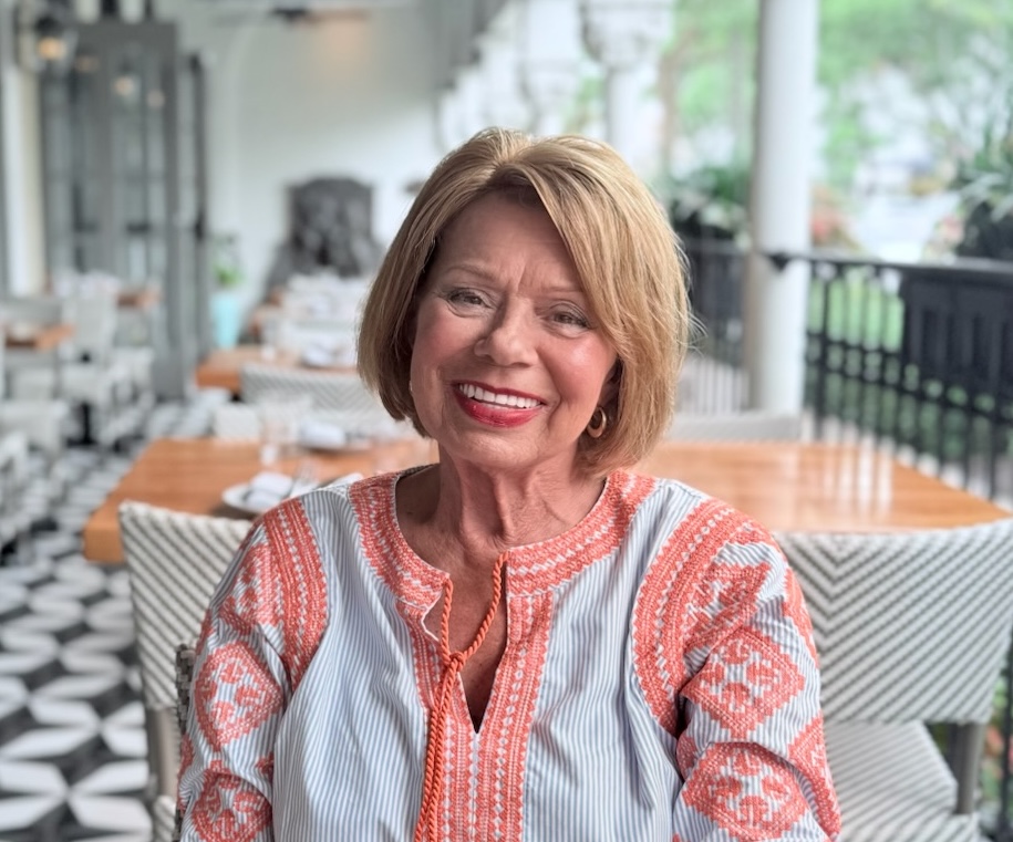 Vicki Jones smiling at an outdoor café
